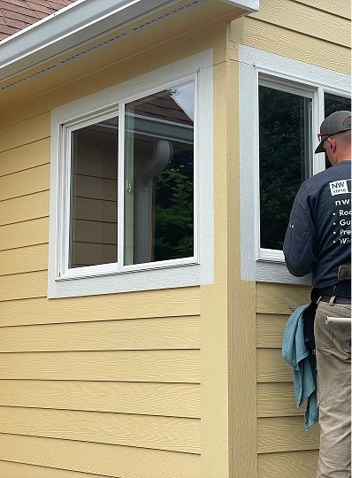 expert-cleaning-outside-window