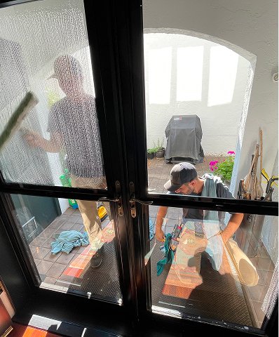 interior-window-getting-cleaned-by-professionals