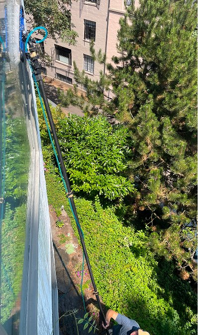 long-brush-cleaning-exterior-windows